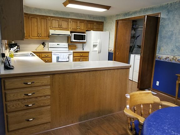 Upstairs laundry or pantry.