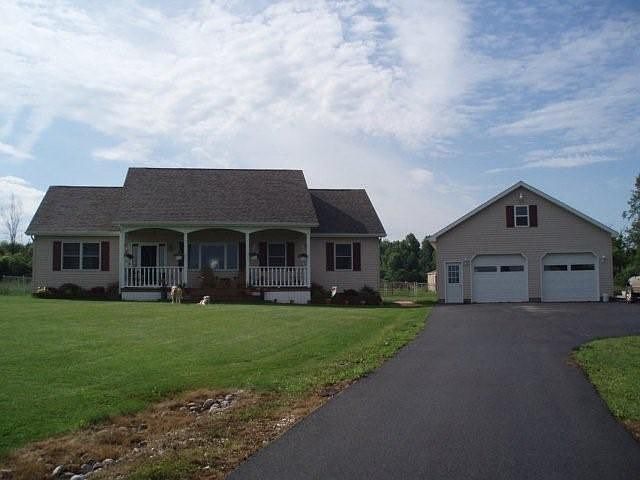 front of home with 500' paved driveway