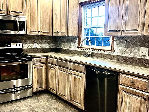 electric stove, microwave, dishwasher,