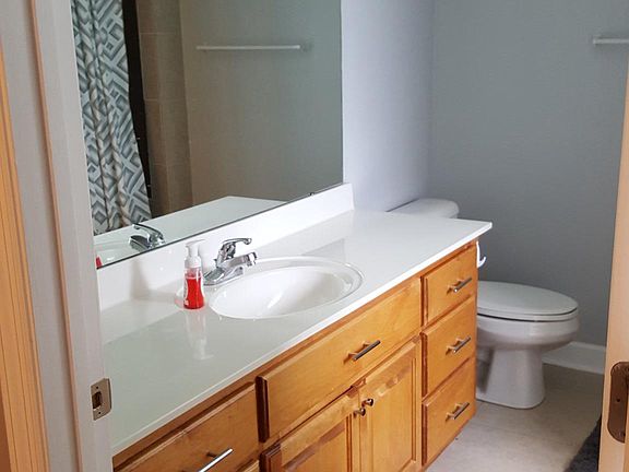 Master bath with shower and soaking tub