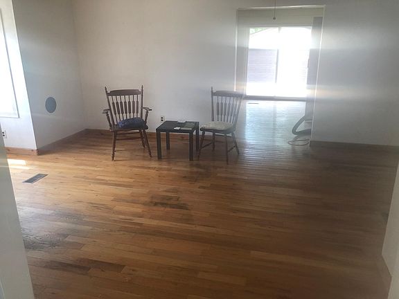Large dining room with cut out area for a desk or sitting area
