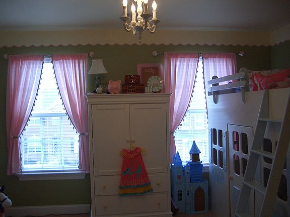 1 of 3 bedrooms upstairs all with walk in closets.