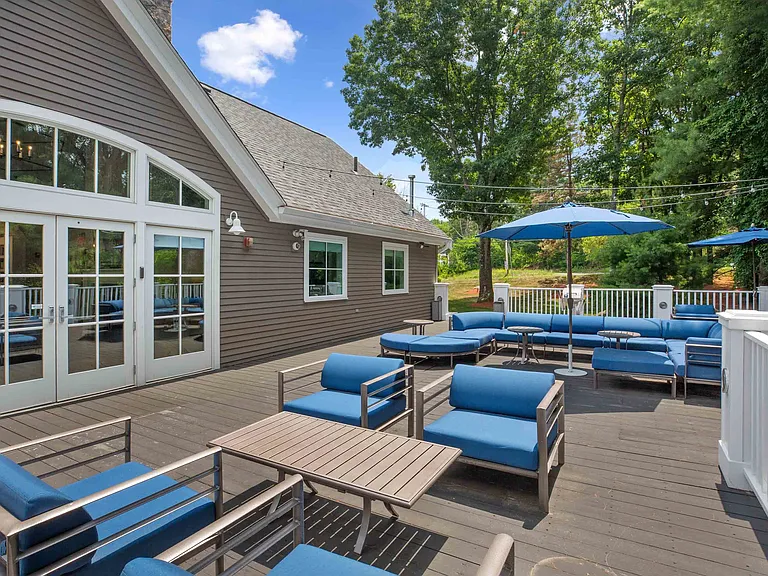 Expansive sundeck with lounge chairs