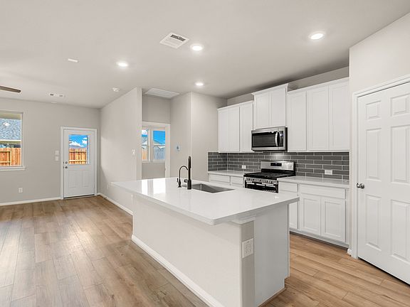 The kitchen has an extended counterspace perfect for a breakfast bar