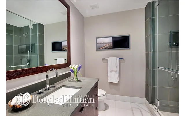 Sold by Douglas Elliman | media 18