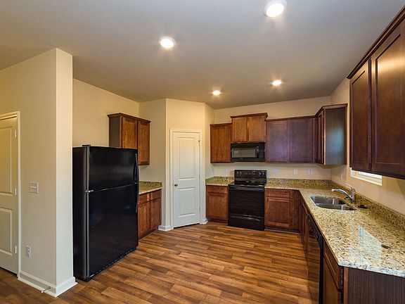 This move-in ready home features gorgeous granite countertops in the kitchen