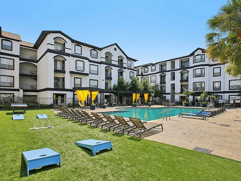 Providence Uptown in Houston features a sparkling resort-style pool and tanning deck perfect for relaxing and entertaining.