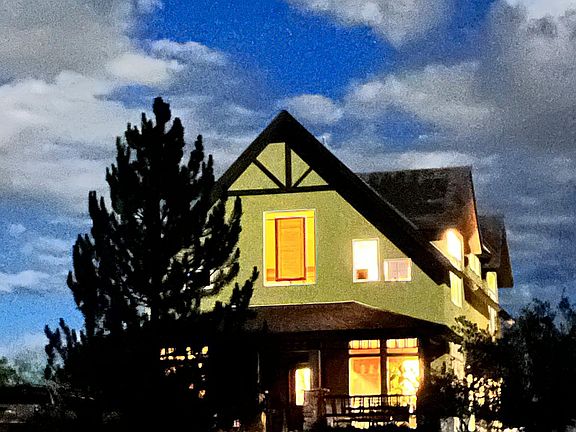 Front of home at night.