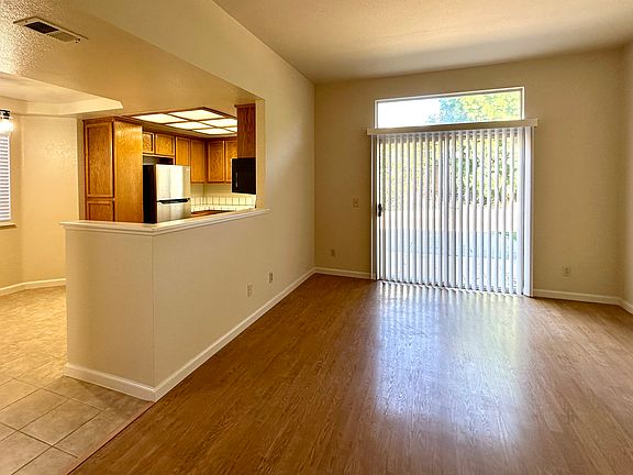 Family Room:
Photo from the wood burning fireplace towards the Kitchen and back yard.