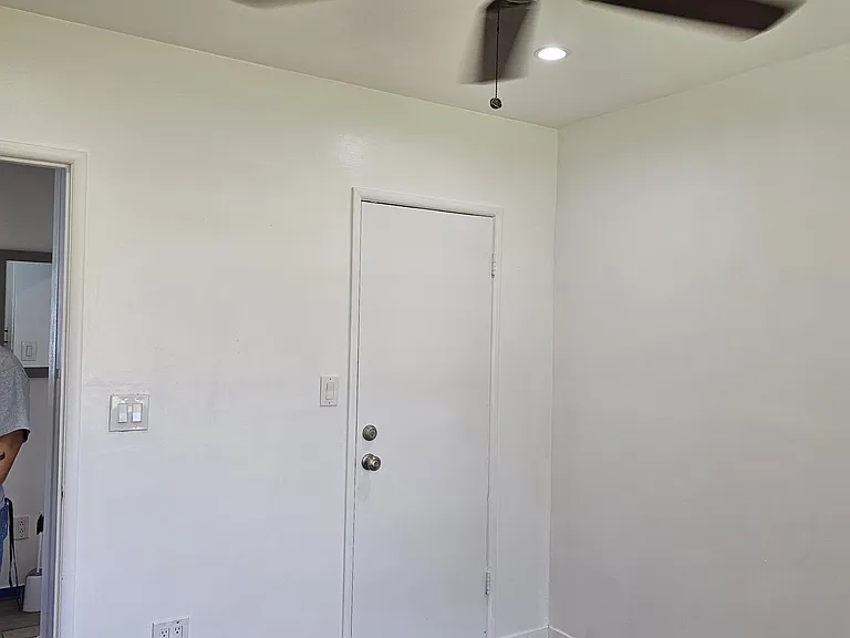 Bedroom, with door to closet in closed position.