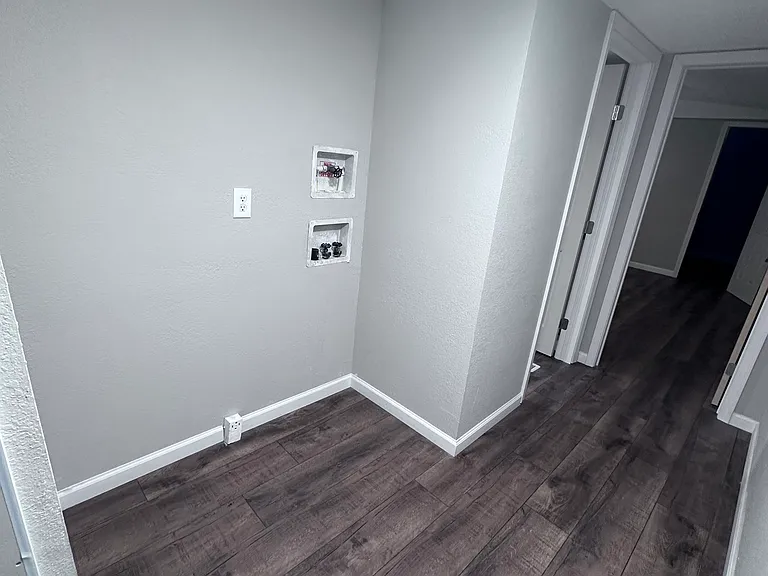2ND HALL WITH LAUNDRY AREA LEADS TO MASTER BR & ROOM 4