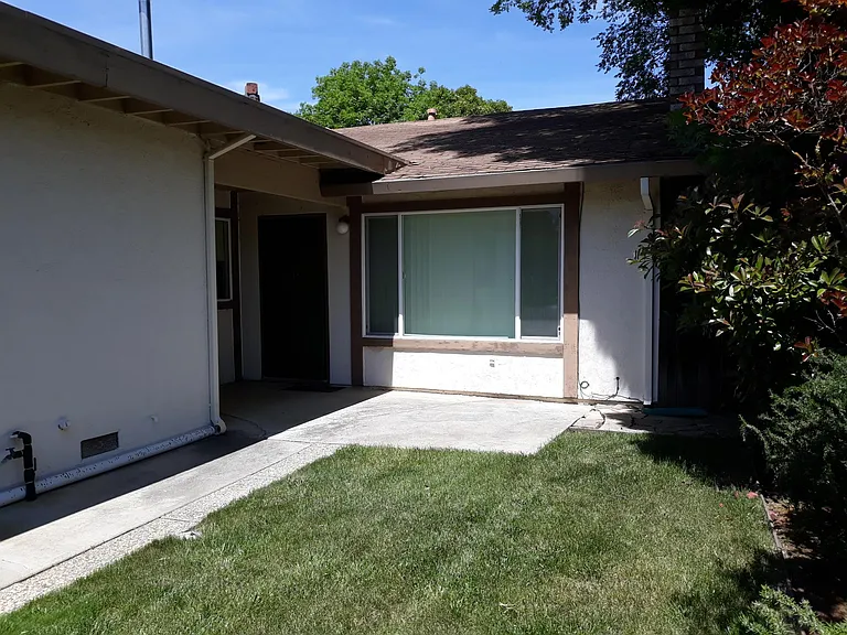 Entry to the home. Patio and front courtyard.