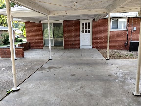 2 car carport with covered patio