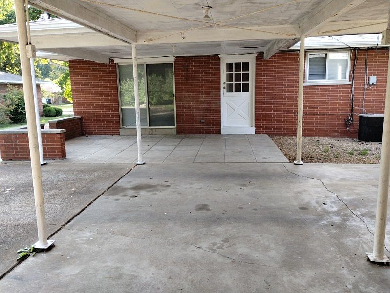2 car carport with covered patio