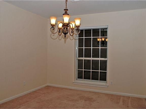 Formal dining room adjacent to the formal living room.