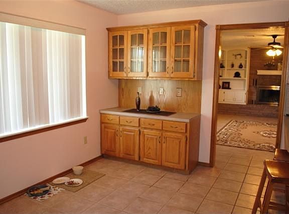 Dining area in kitchen with built-in china cabinet