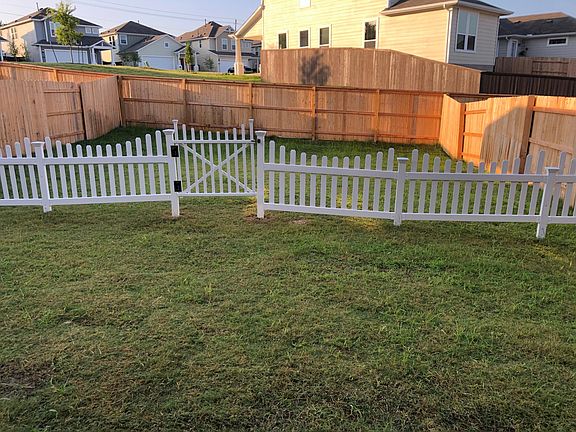 Backyard with small fence