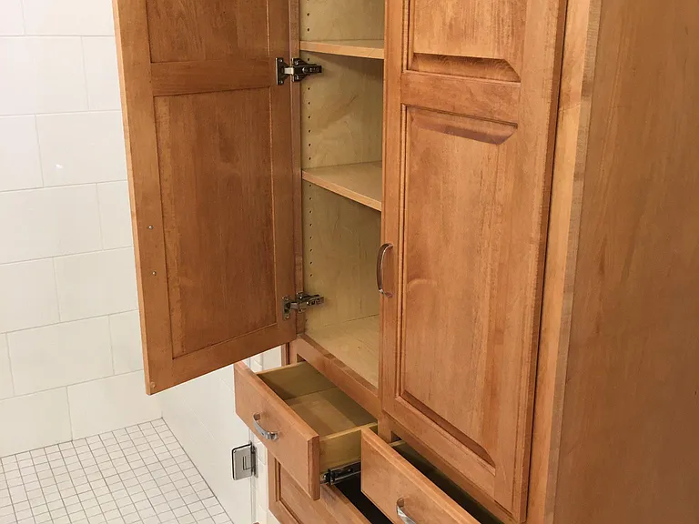 Solid maple cabinet in bathroom