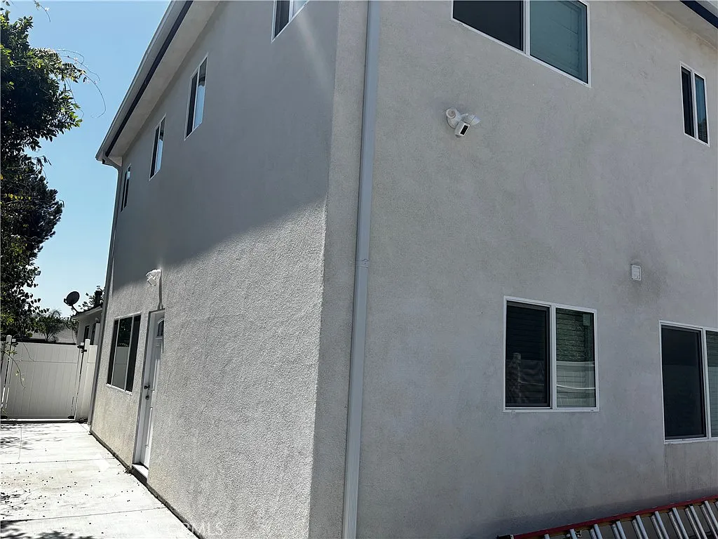 Building Photo - 19943 Covello St #1/2