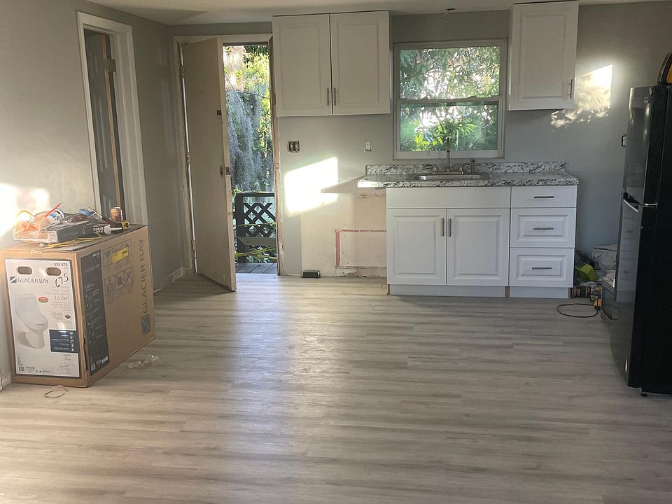Kitchen - still being updated in this pic. Kitchen opens to the living room