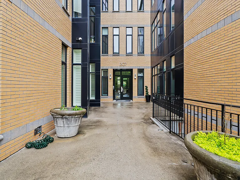 Secure Courtyard Entrance with Modern Architecture