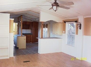 Living room looking into kitchen