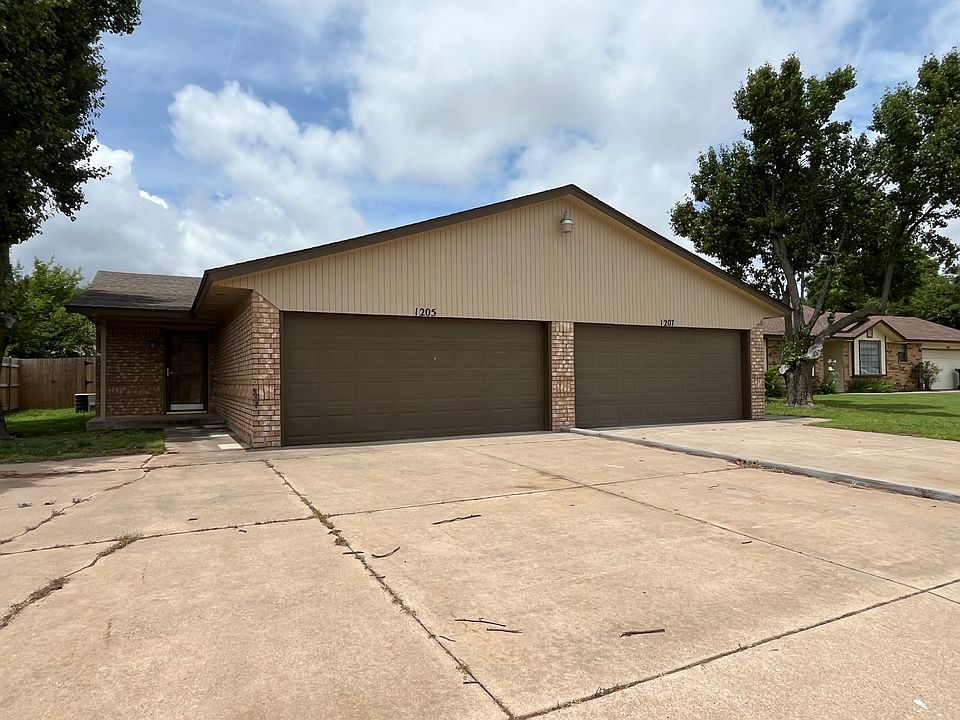 Newly repainted 2 car garage with attic storage