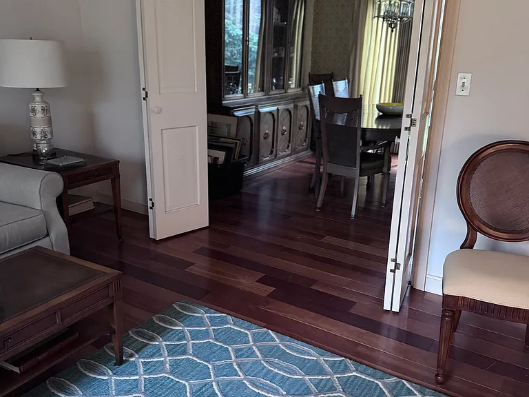 Living room looking into separate dining room.