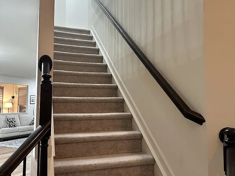 Staircase leading to the second-level loft