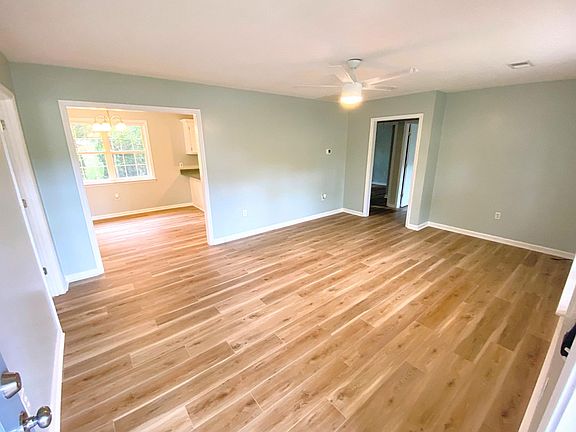 Living Room and looking into the Dining/Kitchen area