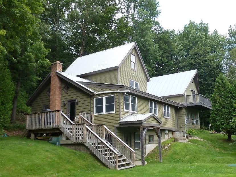 view of the house. Apt is in the middle