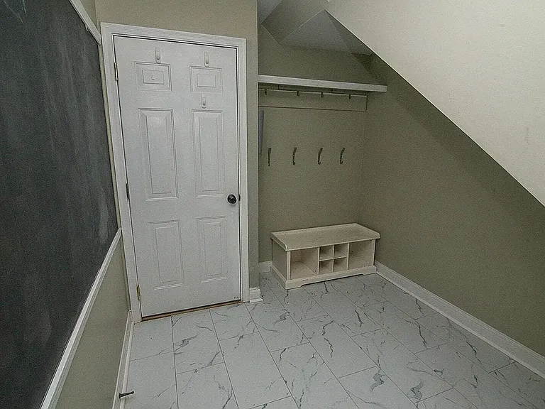 Garage door (Next to kitchen and second Staircase)