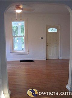 Living room and main entrance viewed from dining area