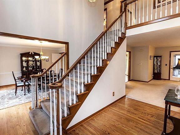 2 story great opens to formal living and dining rooms.