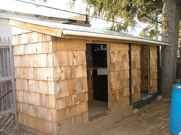 NEW WORK SHOP AND PELLET STORAGE