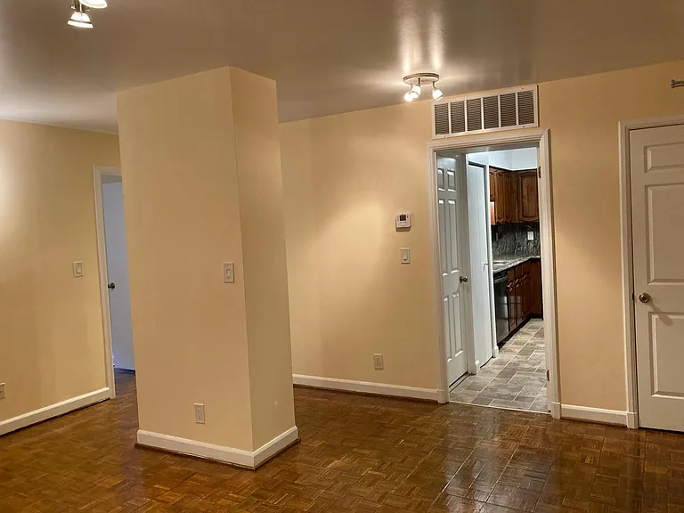Living room area looking into kitchen