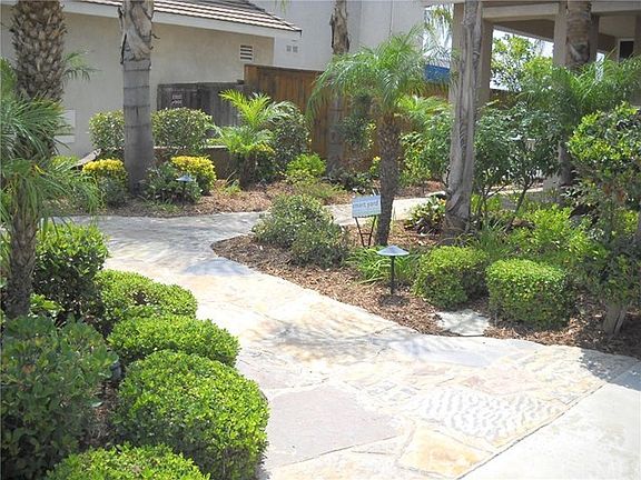 Flagstone sidewalk to front door.