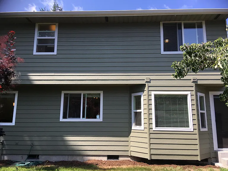 Back of home, energy efficient double-pane vinyl windows