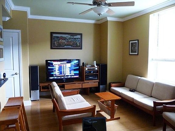 High ceilings, heavy moldings, big windows, and bamboo floors are some of the features you can enjoy