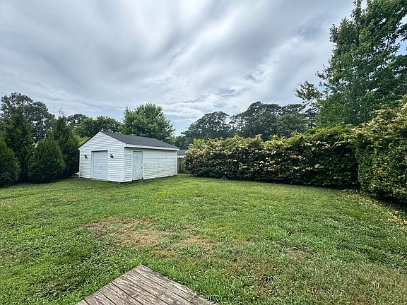 Detached garage is partial garage, partial custom home office.