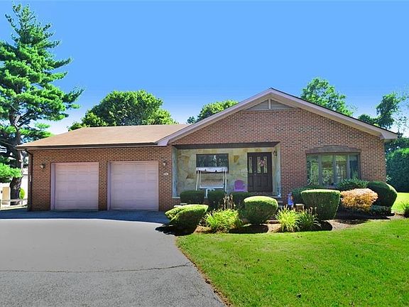 Front view of this handsome custom built home.