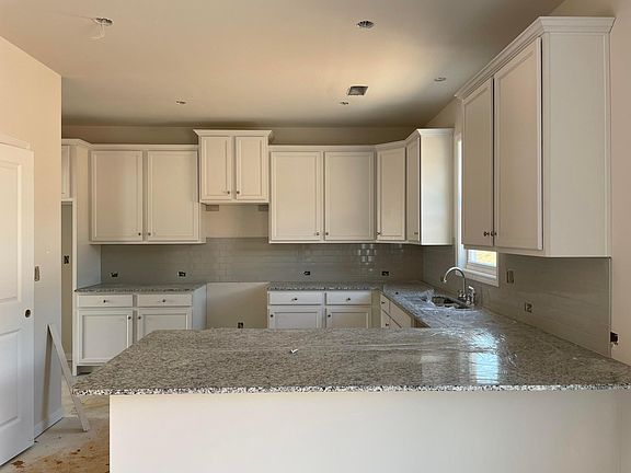 Kitchen and Peninsula for barstools.