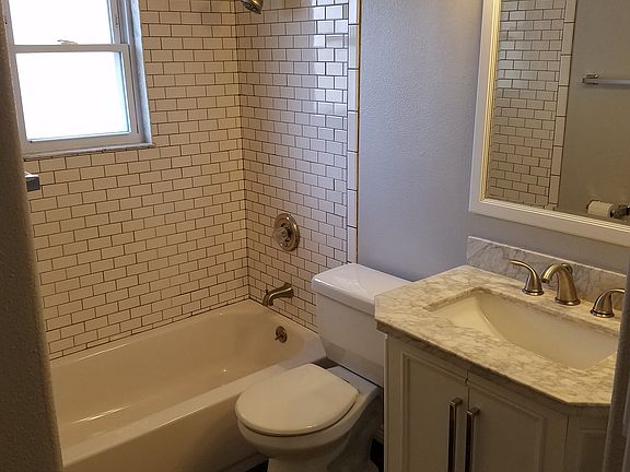 Bathroom with tub and shower