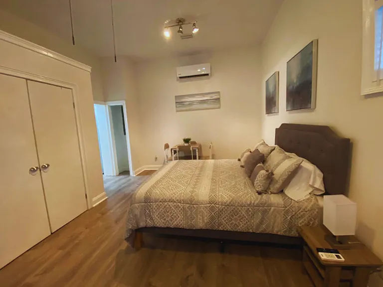 Cozy room with air conditioning for a comfortable temperature.