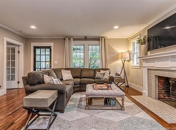 Living room w brick fire place