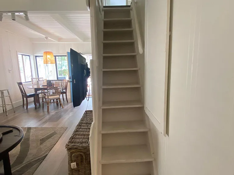 Steep and narrow Tahoe cabin style stairs to get to upstairs bedrooms, loft and 1/2 h bathroom.