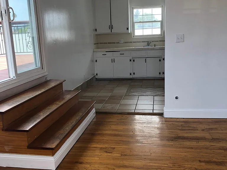 These are the stairs that lead to the private rooftop patio which is exclusively for this apartment.