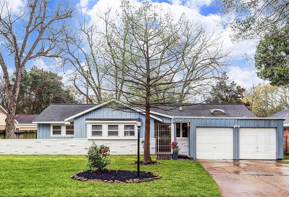 Charming, thoroughly remodeled four bedroom, THREE bathroom home with large backyard and additional side courtyard!