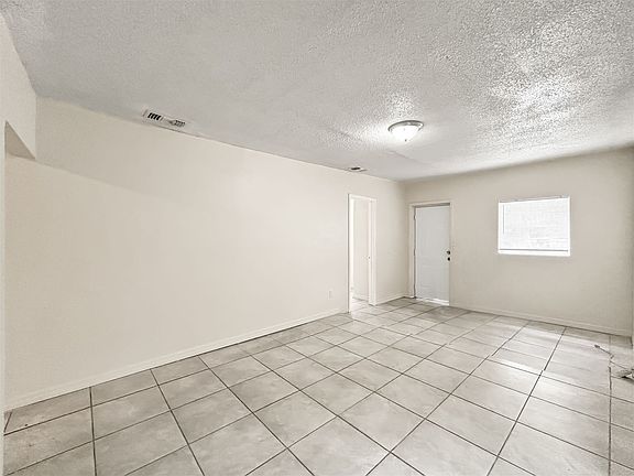 3rd image of 3411 E 9th Ave