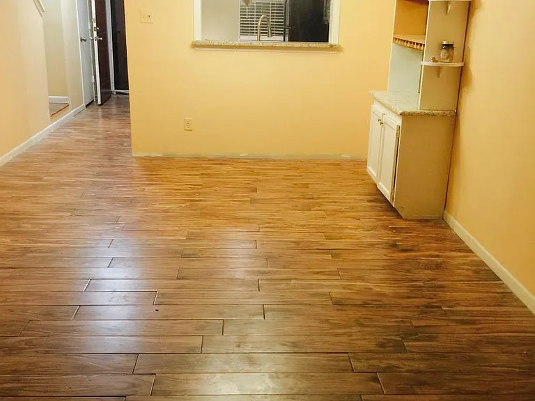 living/dining room with built in bar